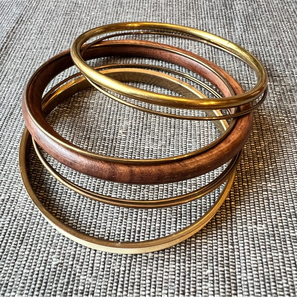 Golden Bronze, Brown Wood and Cream Enamel Seven Piece Bangle Set